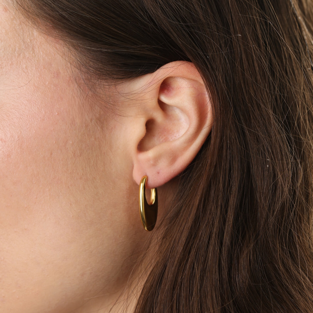 Runa – liquid earrings in stainless steel, gold | Timi of Sweden