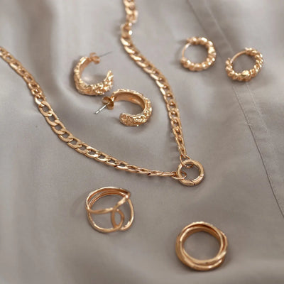 Dicke unebene Creolen - Gold